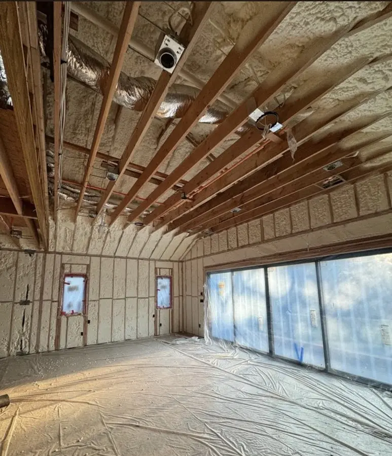 Interior walls and ceiling insulated with spray foam during new construction in Bee Cave